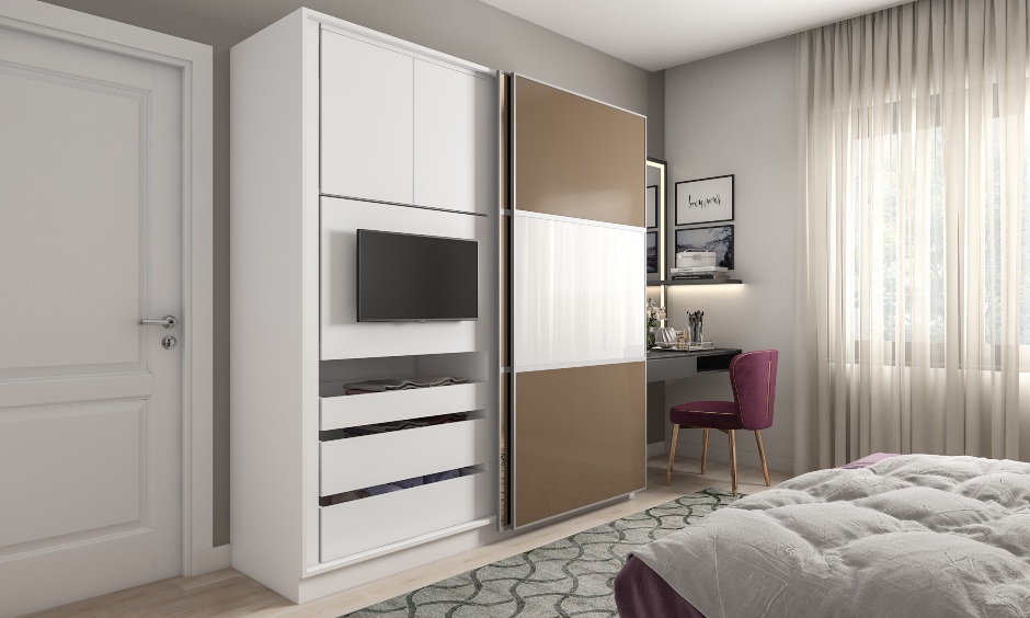 Wardrobe design for bedroom with a white and brown sliding door wardrobe with an in-built tv unit